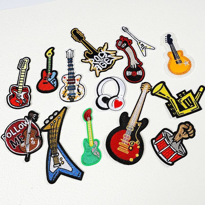 شارة غيتار مُطَّرزة لحقيبة الظ - مراجعة Picture Of Musical Instrument وسعره
